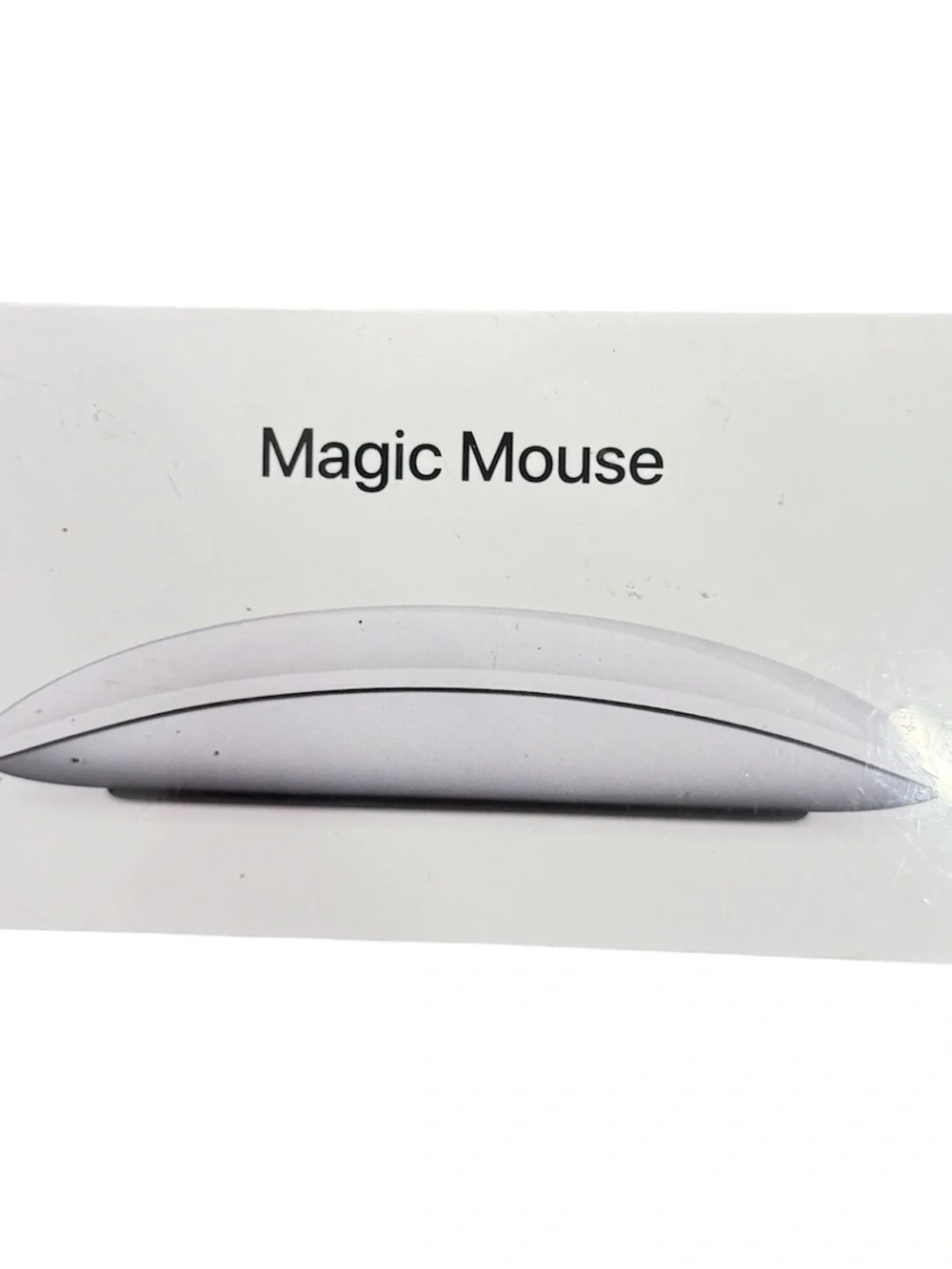 Apple Wireless Magic Mouse in White and Silver with Black Feet